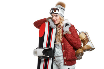 attractive young woman standing holding snowboard