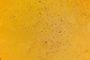 Yellow textured wall surface background
