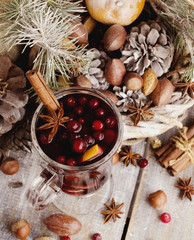 Cup of hot wine Christmas card with fir-tree branches