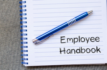 Employee handbook text concept on notebook - 119875113
