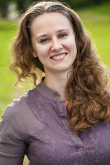 Portrait of beautiful young happy woman