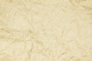 Recycled crumpled brown paper texture or paper background for design with copy space for text or image.