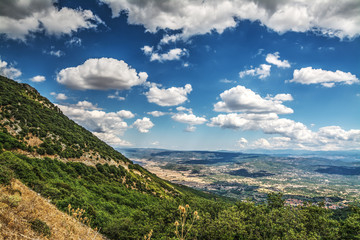 Fototapeta na wymiar clouds over Monte Pisanu valley
