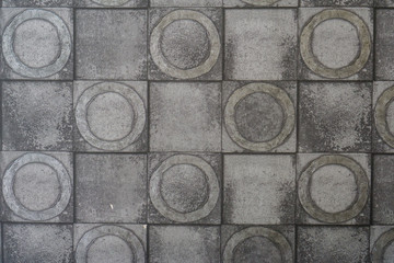 Gray cement wall with swell square and circle texture for background