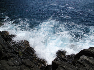 waves crashing on the rocks of the 5 lands c