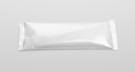 Top view of blank plastic pouch snack packaging on gray background with clipping path
