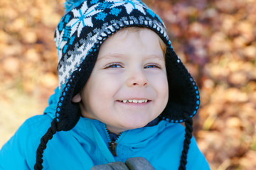 Portrait of little boy of two years outdoor
