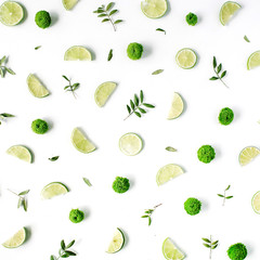 lime and green branches pattern on white background. flat lay, top view