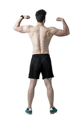Fototapeta premium Shirtless athlete flexing back, shoulders and arms muscles rear view. Toned desaturated full body length portrait isolated on white studio background.