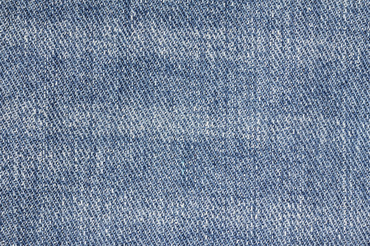 Denim jeans texture or denim jeans background. Old grunge vintage denim jeans. Stitched texture denim jeans background of jeans fashion design.
