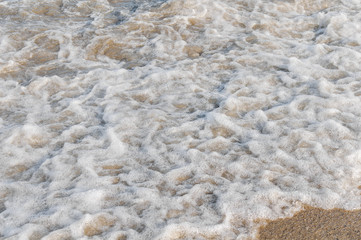 Fototapeta na wymiar Sea foam havy wave background