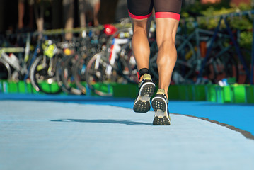 Running triathlete in the transition zone 