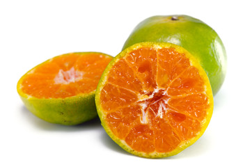 Fototapeta na wymiar Orange fruit with half view isolated on white