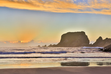 Obraz premium Eroded Cliffs on sunset background . Westport, New Zealand