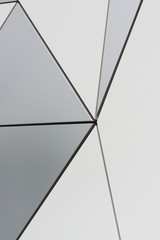 Wall of triangular composite panels