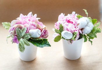 bouquets of peonies in a small vase