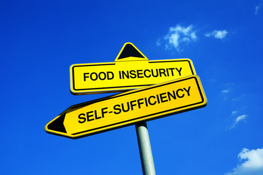 Food Insecurity Or Self-Sufficiency - Traffic Sign With Two Options - Appeal To Have Self Sufficient Agriculture And Cultivation Of Land. Prevention Against Starvation And Famine During Crop Failure