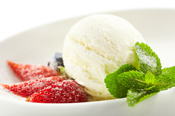 Ice Cream Garnished with Strawberry and Mint