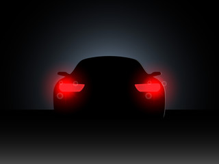 The car in the dark with the included headlights.