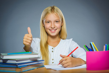 school concept. Closeup portrait successful happy girl draws pencil