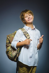 school concept. portrait successful happy boy with knapsack