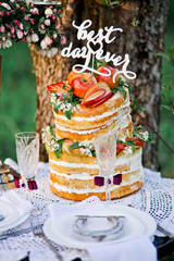 Sweet and tasty wedding cake with berries