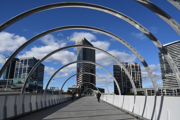 Naklejka premium lattice bridge structure with towersin background