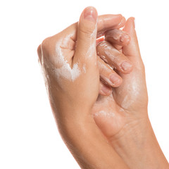 Female hands and moisturizing cream