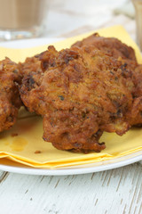 Onion Bhajis a spicy Indian snack of onions fried in batter