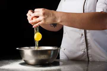 Woman hands kneading dough.