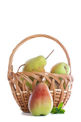 Ripe pears in a basket