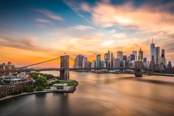 Fotobehang De Stadshorizon van New York over de Brooklyn Bridge. © SeanPavonePhoto