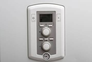 Control panel of DHW or central heating on combi boiler in restroom.