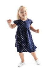 Funny little girl dancing on white background
