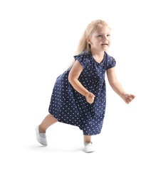 Funny little girl dancing on white background