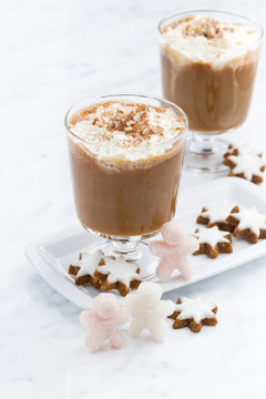 festive spiced pumpkin latte and almond cookies, vertical
