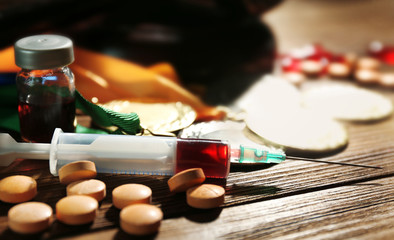 Syringe with pills and medals. Doping in sport concept