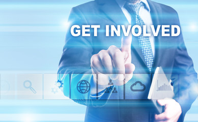 Businessman is pressing button on touch screen interface and selecting 