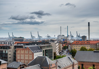 Fototapeta na wymiar Aarhus skyline with harbor and cranes in Denmark