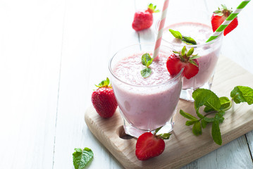 Milkshake with fresh strawberries
