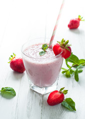 Milkshake with fresh strawberries