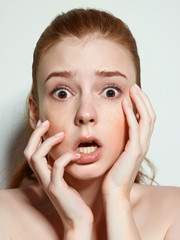 Emotional beauty portraits red-haired girl.