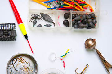 Fishing baits and equipment isolated on white background