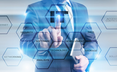 Businessman pressing button on virtual screen and select IT (Information technology) concept.