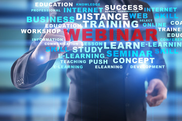 Webinar. E-learning concept.  Businessman is selecting on virtal screen/ 