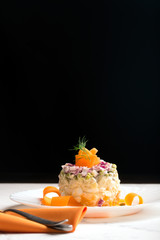 Traditional Russian salad olivie with boiled vegetables
