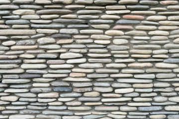 old and dirty stone stack wall for abstract background.