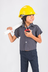  Little cute asian girl in the construction helmet with a poster