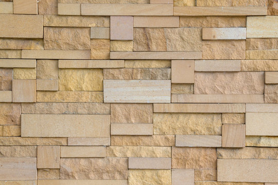 Pattern of grey and rough sandstone wall texture and backgroundArt sandstone texture background, natural surface