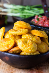 Latin American food. Traditional chilenian homemade pumpkin sopaipillas with salsa